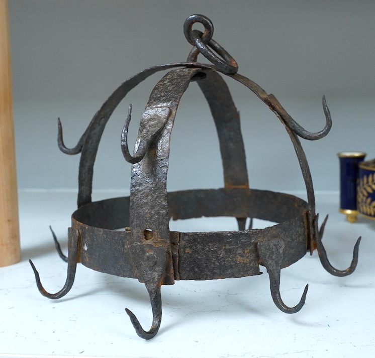 An 18th century Dutch wrought iron game hanger, 26cm high. Condition - fair considering age and use